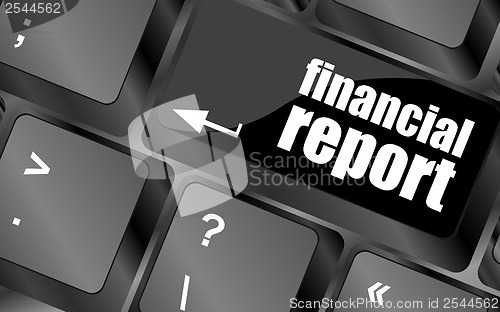 Image of keyboard key with financial report button