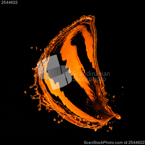 Image of orange water splash isolated on black