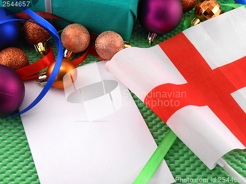 Image of England flag with christmas decoration, new year card
