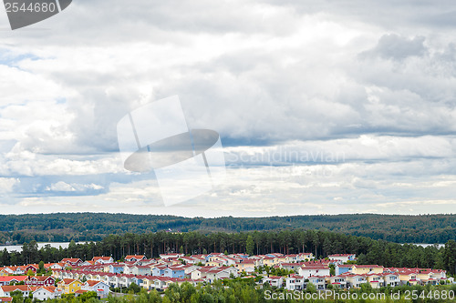 Image of View over residential neighborhood surrounded by nature