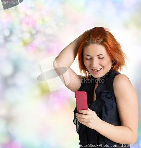 Image of Joyful Emotional happy woman with red hair and a t