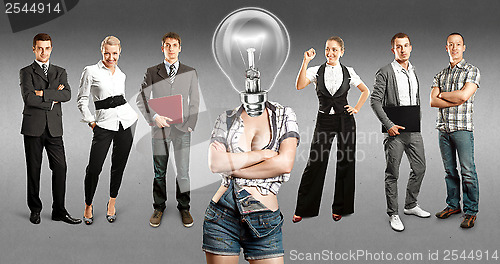 Image of Business Team With Lamp Head