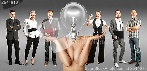 Image of Business Team With Lamp Head