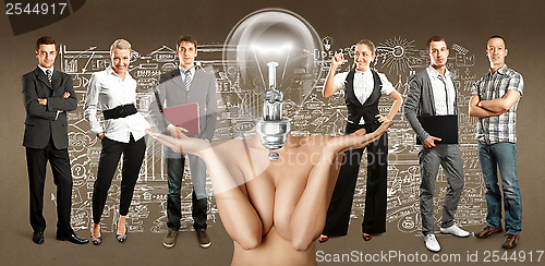 Image of Business Team With Lamp Head