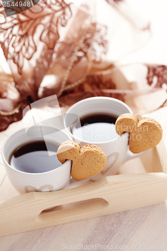 Image of coffee with cookie
