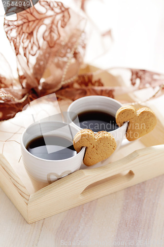 Image of coffee with cookie