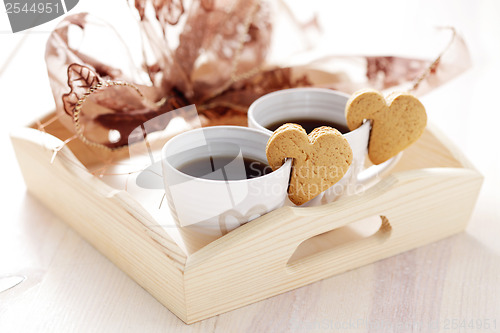 Image of coffee with cookie