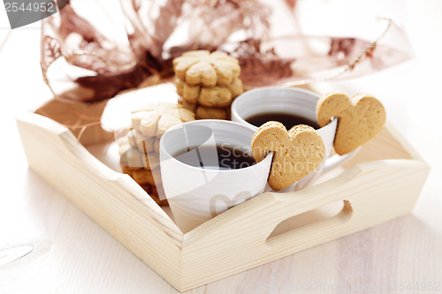 Image of coffee with cookie