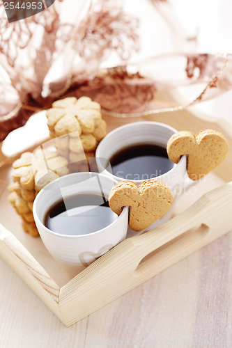 Image of coffee with cookie