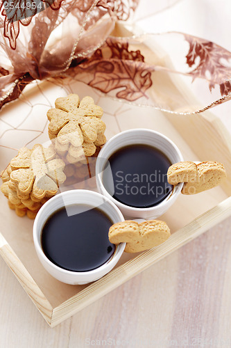 Image of coffee with cookie