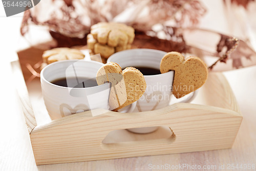 Image of coffee with cookie