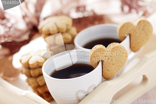 Image of coffee with cookie