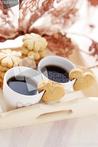 Image of coffee with cookie