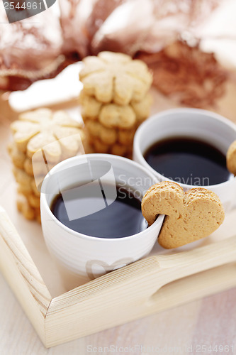 Image of coffee with cookie