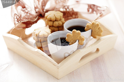 Image of coffee with cookie