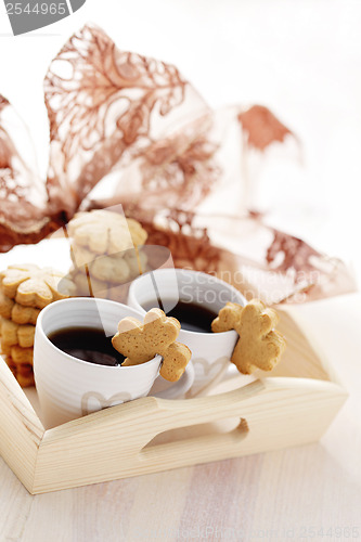 Image of coffee with cookie