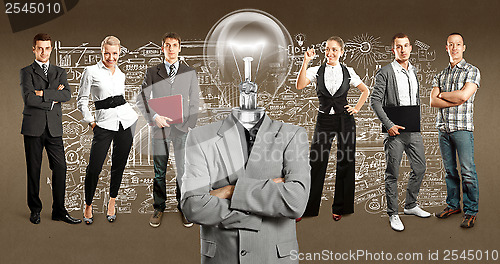 Image of Business Team With Lamp Head