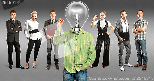 Image of Business Team With Lamp Head