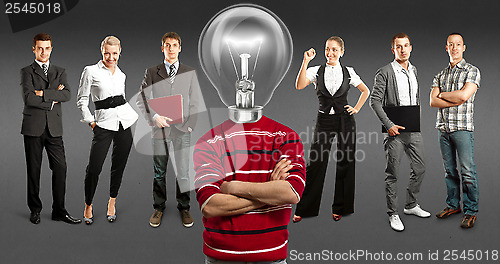 Image of Business Team With Lamp Head