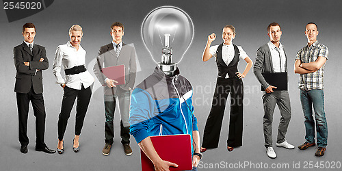 Image of Business Team With Lamp Head