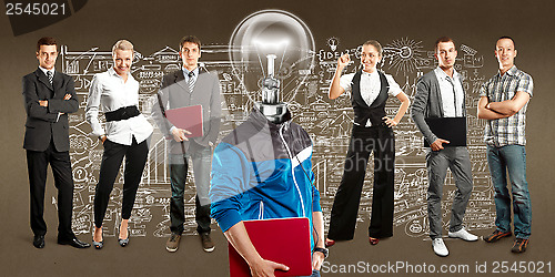 Image of Business Team With Lamp Head