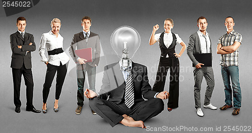 Image of Business Team With Lamp Head