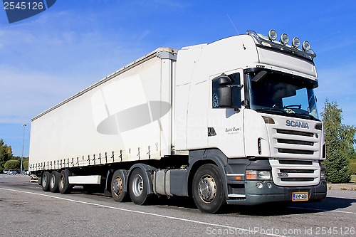 Image of Big White Scania Truck and Trailer