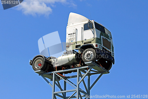 Image of Vintage Freightliner Truck up against Blue Sky