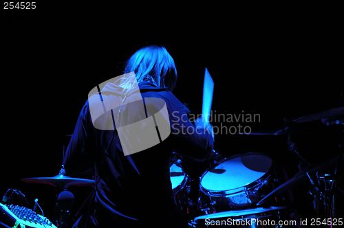 Image of Drummer playing.