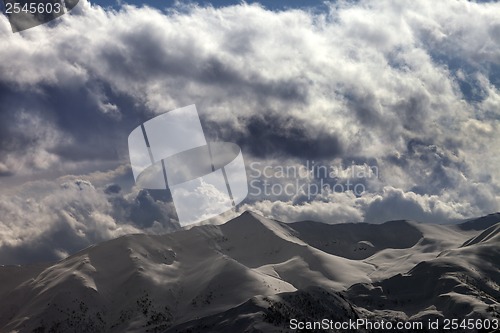 Image of Evening mountains and cloudy sky