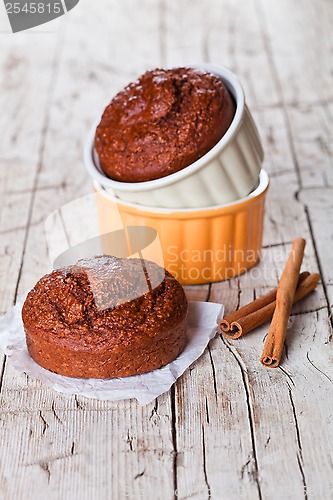 Image of fresh baked browny cakes and cinnamon sticks