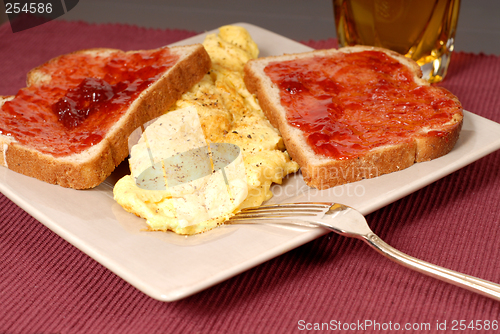 Image of Omelette with toast, strawberry jam and apple juice