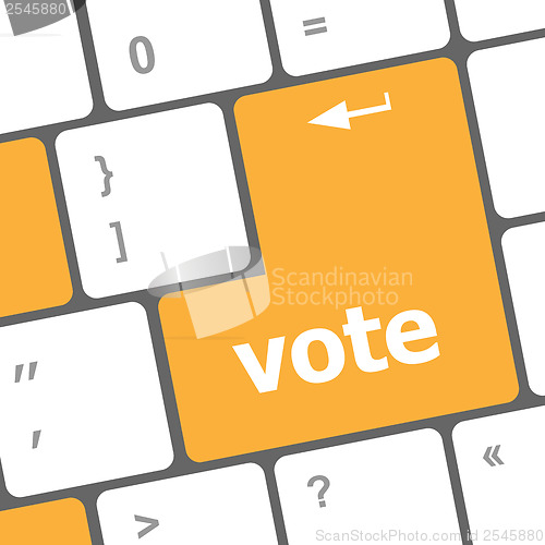 Image of vote button on computer keyboard key