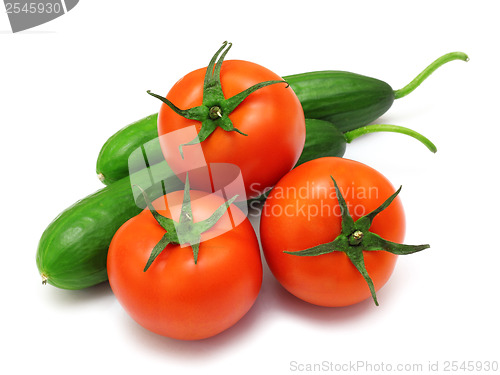 Image of Tomato and cucumber isolated on white