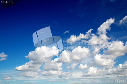 Image of Blue sky with cotton like clouds