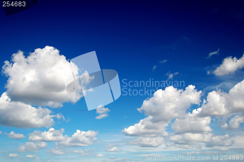 Image of Blue sky with cotton like clouds