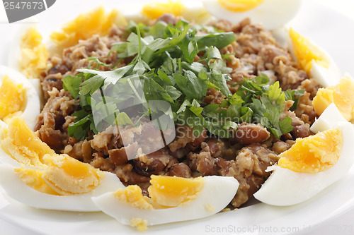 Image of Egyptian foul with boiled eggs
