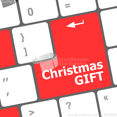 Image of Computer keyboard key with christmas gift words