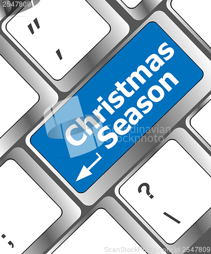 Image of Computer keyboard key with christmas season words