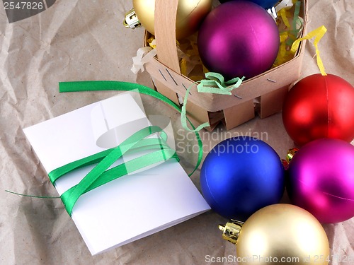 Image of New year and christmas celebration, balls and invitation card