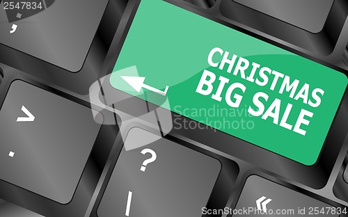 Image of christmas big sale on computer keyboard key button