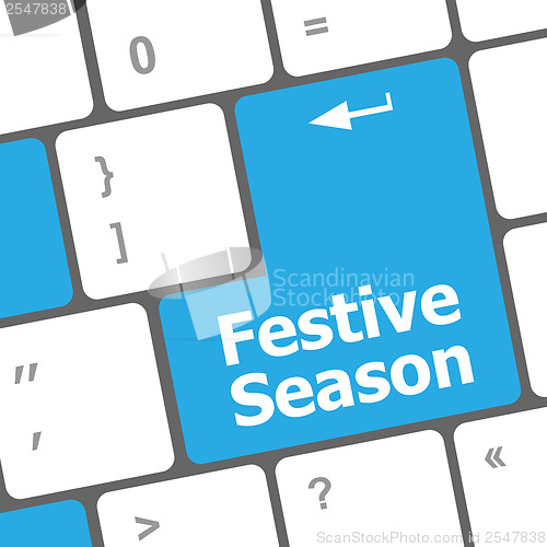 Image of festive season button on modern internet computer keyboard key