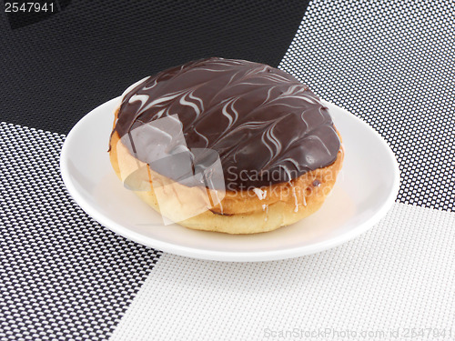 Image of chocolate cake on white plate