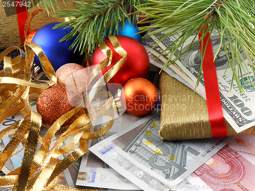 Image of Decorated christmas tree with money, traditional new year holiday card