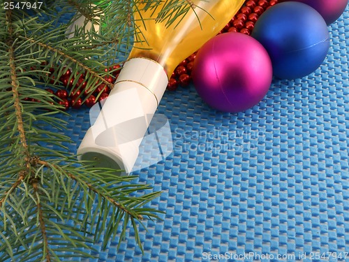 Image of champagne and balls as a New Year decoration, winter holidays