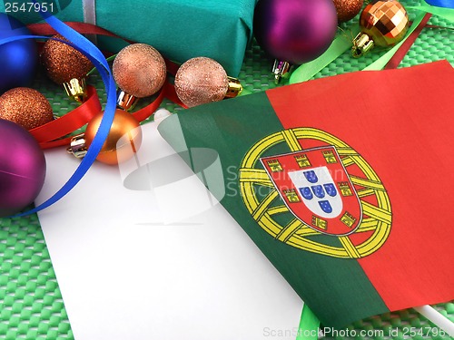 Image of portugal flag with christmas decoration, new year card