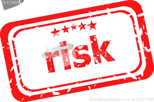 Image of risk red rubber stamp over a white background