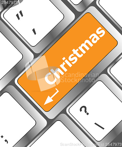 Image of christmas button on the keyboard key - holiday concept