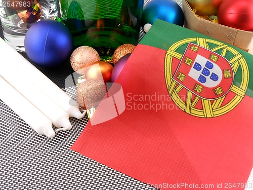 Image of portugal flag with christmas decoration, new year card