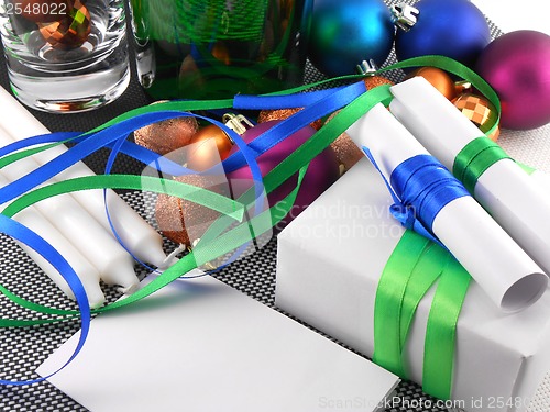 Image of Christmas gift box with decoration